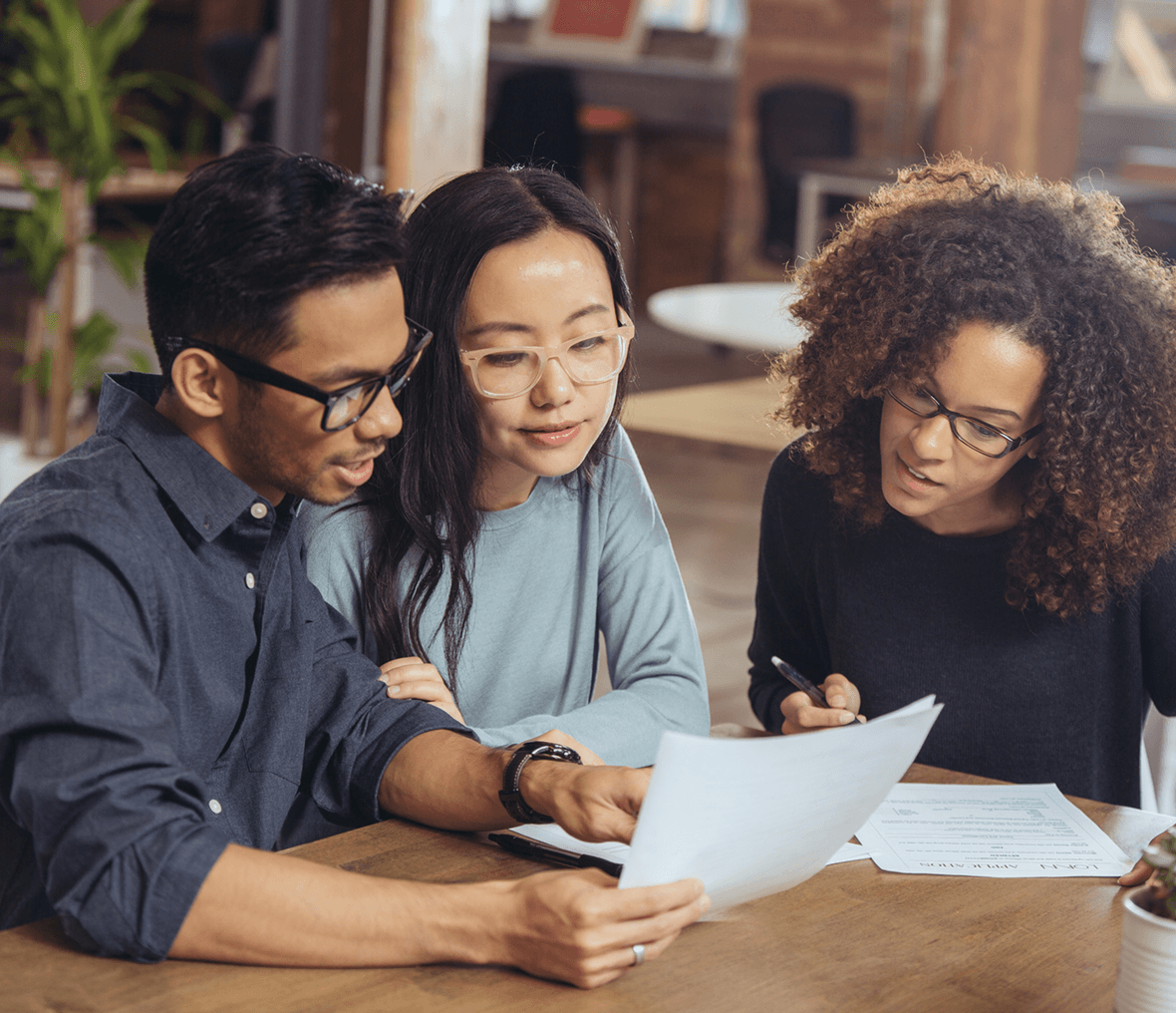 Group discussing business report