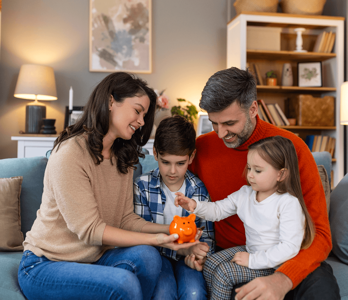 Happy family with piggy bank