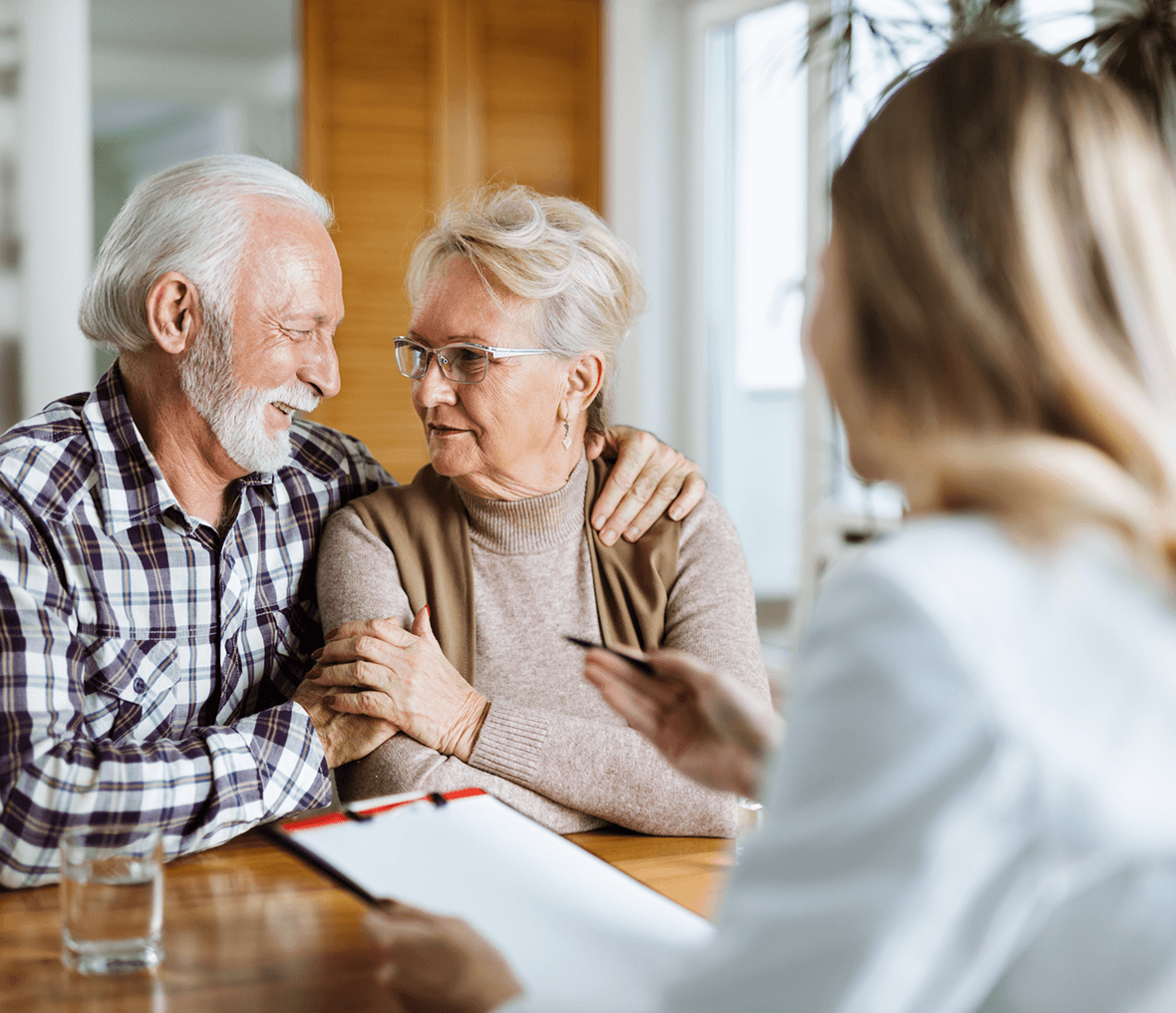 Senior couple meeting with advisor